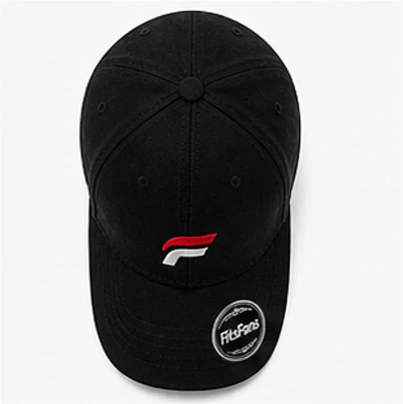 Black baseball cap with red and white embroidered logo, curved brim, top view