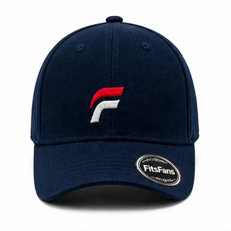 Navy blue baseball cap with red and white embroidered logo and FitsFans sticker on the brim.