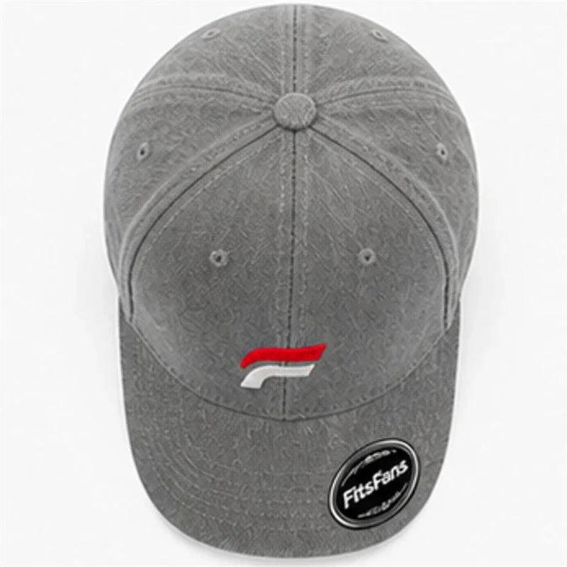 Gray baseball cap with red and white logo and FitsFans sticker on the brim