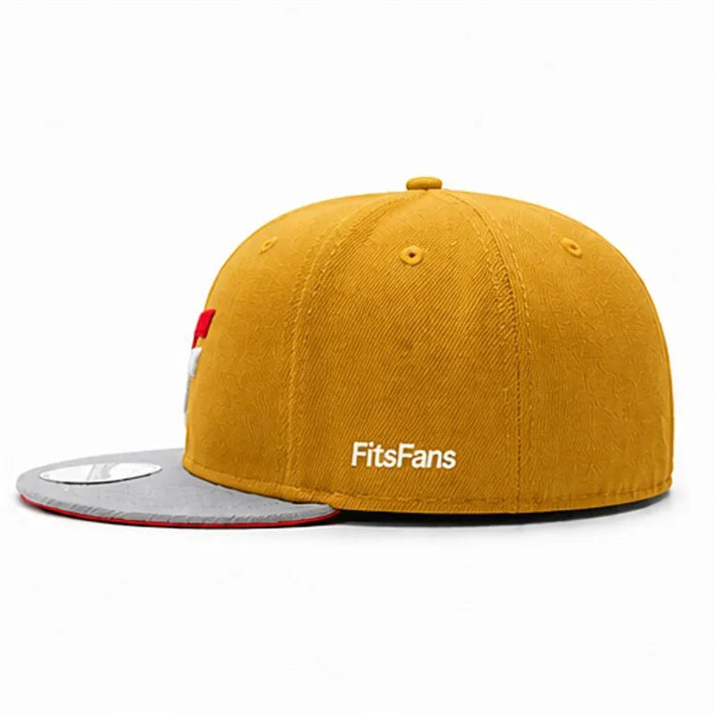 Yellow flat brim baseball cap with gray visor and FitsFans logo, side view.