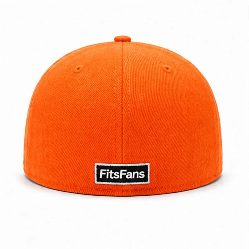 Bright orange fitted cap with embroidered eyelets and FitsFans label on the back