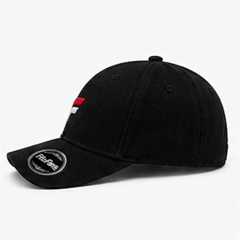 Black curved brim baseball cap with small red, white, and gray embroidered detail on front