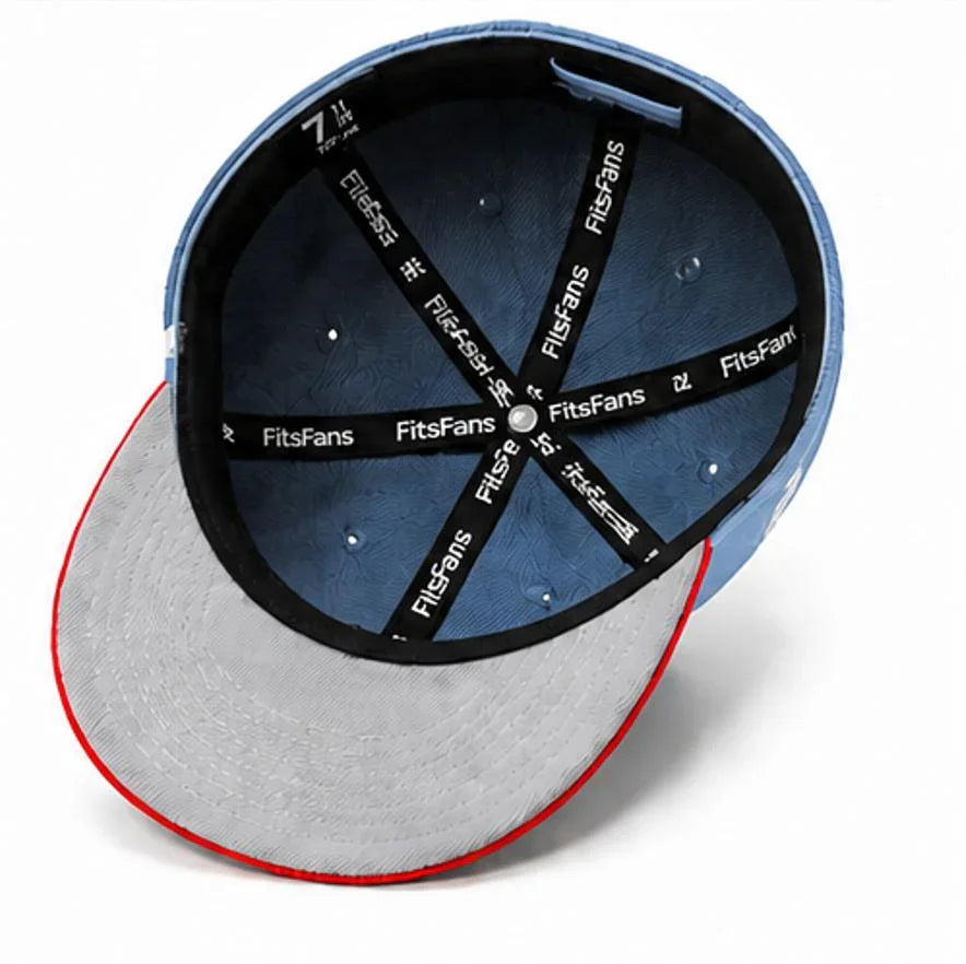 Inside view of a fitted blue and gray baseball cap with black branded sweatband, 7 1/2 size