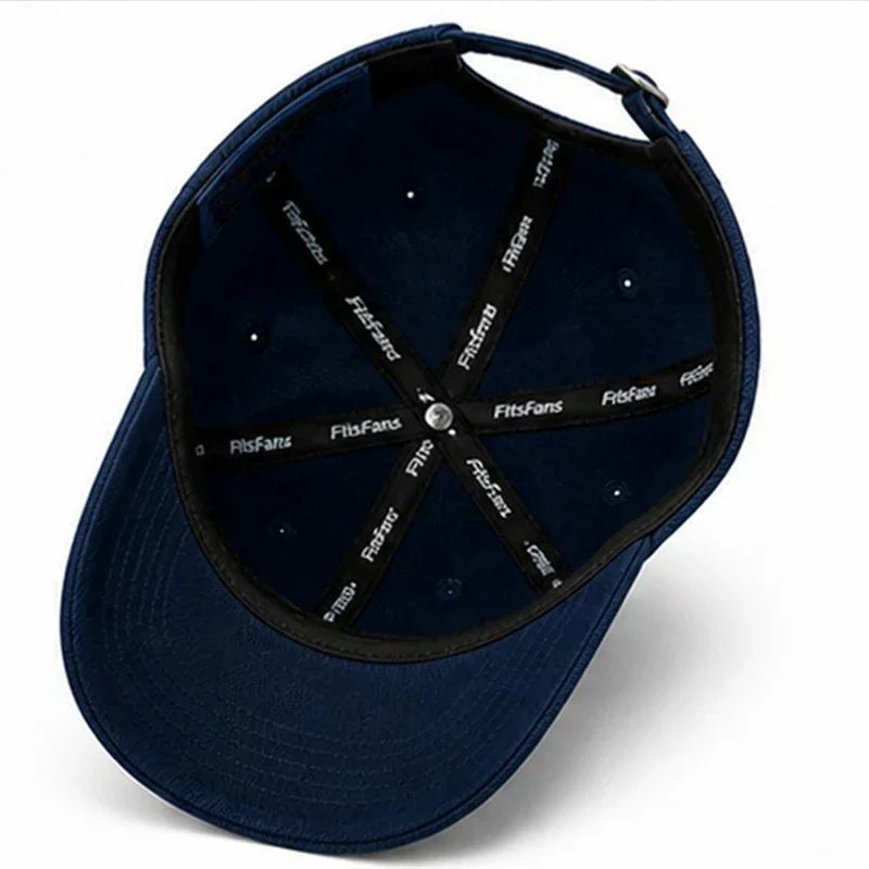 Interior view of navy blue adjustable baseball cap showing branded sweatband and stitching
